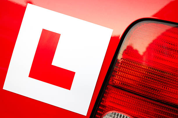 A car with an L plate used for driving lessons in Blackburn